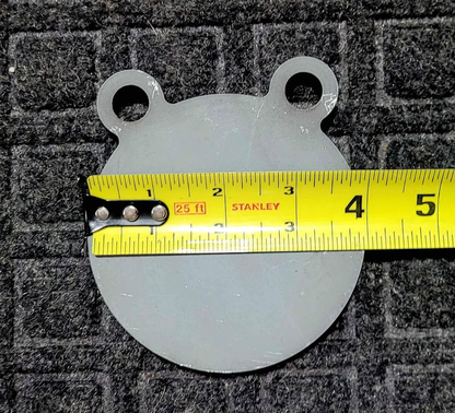 4 inch AR500 steel gong target measured at 4 inches diameter with a tape measure