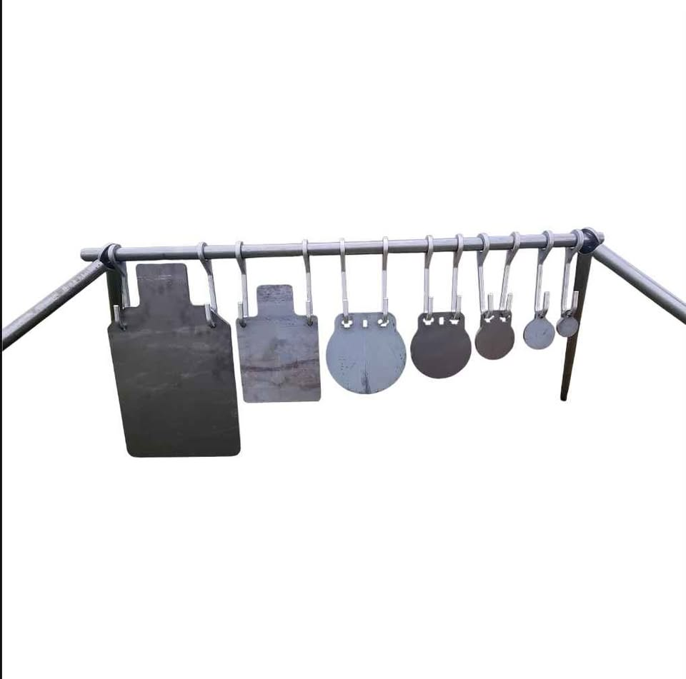 Full shooting target stand setup with AR500 gongs and silhouettes hanging from hooks