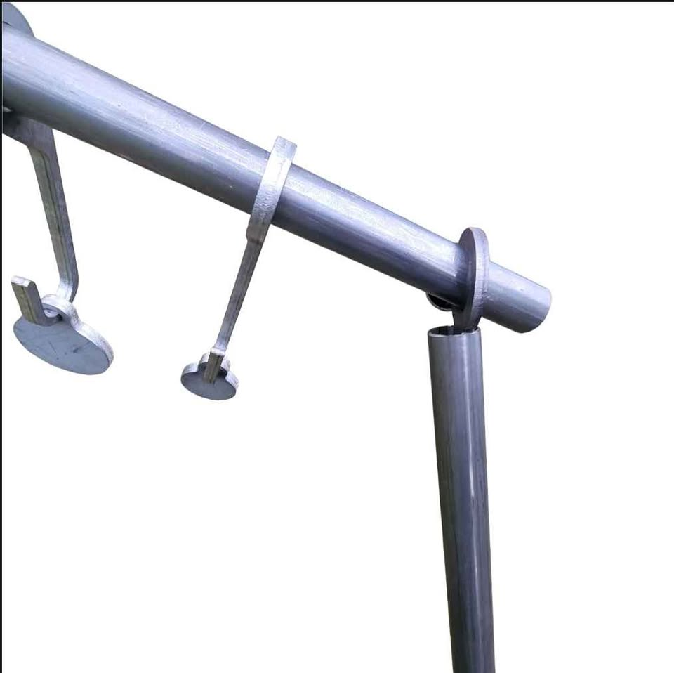 Close-up of AR500 gong hooks on pipe stand with stand end